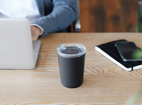 Kinto To-go coffee tumbler on desk