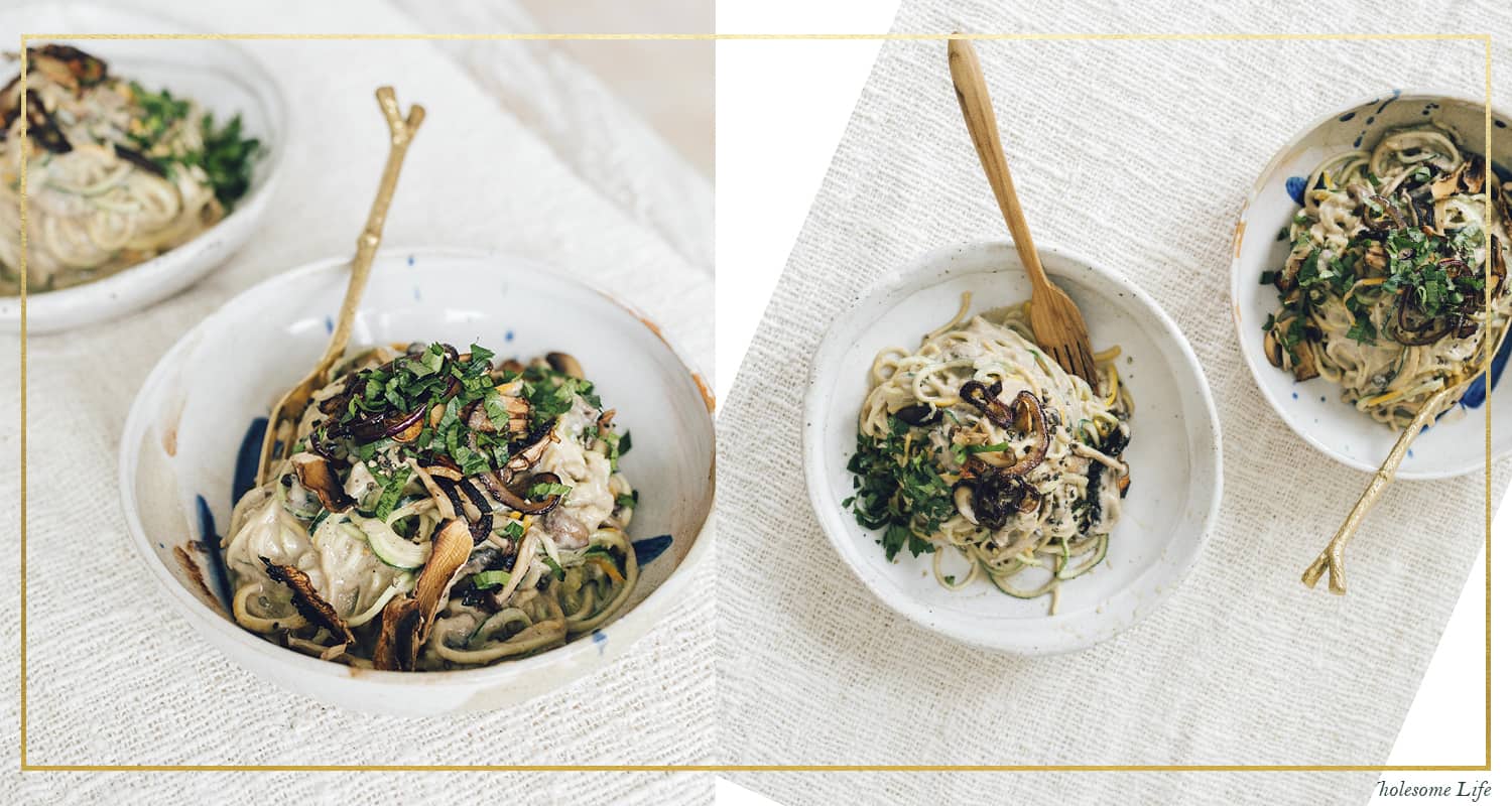 Top view of Vegan Mushroom Alfredo pasta in white bowl by Elsa’s Wholesome Life’sCreamy