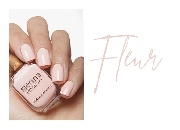 light pink nail polish hand swatch on fair skin tone by sienna