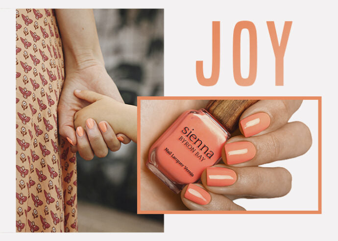 bright peach Nail Polish hand swatch on fair skin tone by sienna