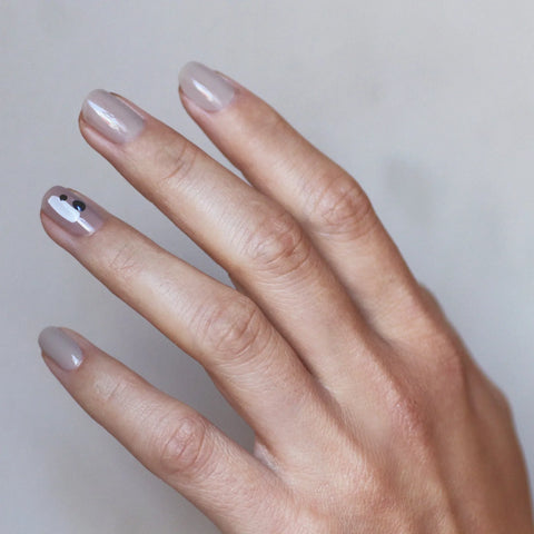 Minimalist dots Nail art hand swatch on fair skin tone by Sienna