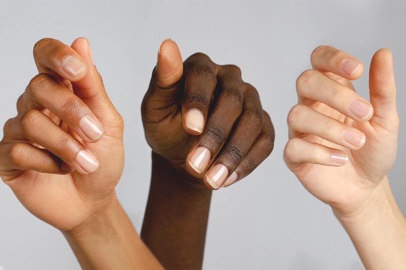 nail strengthener swatch on 3 different skin tone by sienna