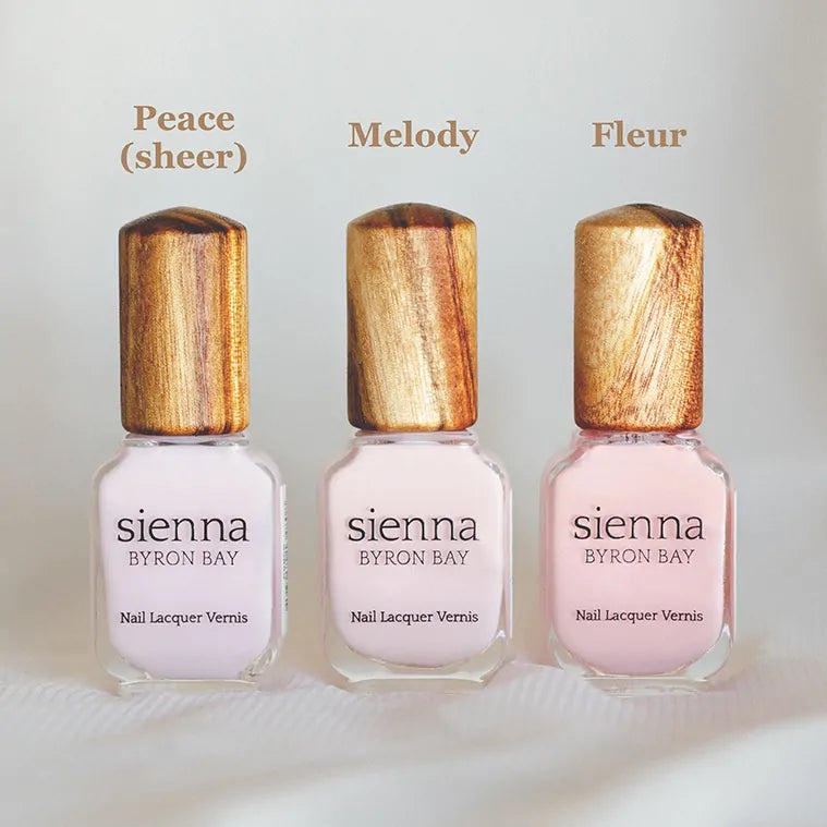 light pink nail polish glass bottle with timber cap by sienna