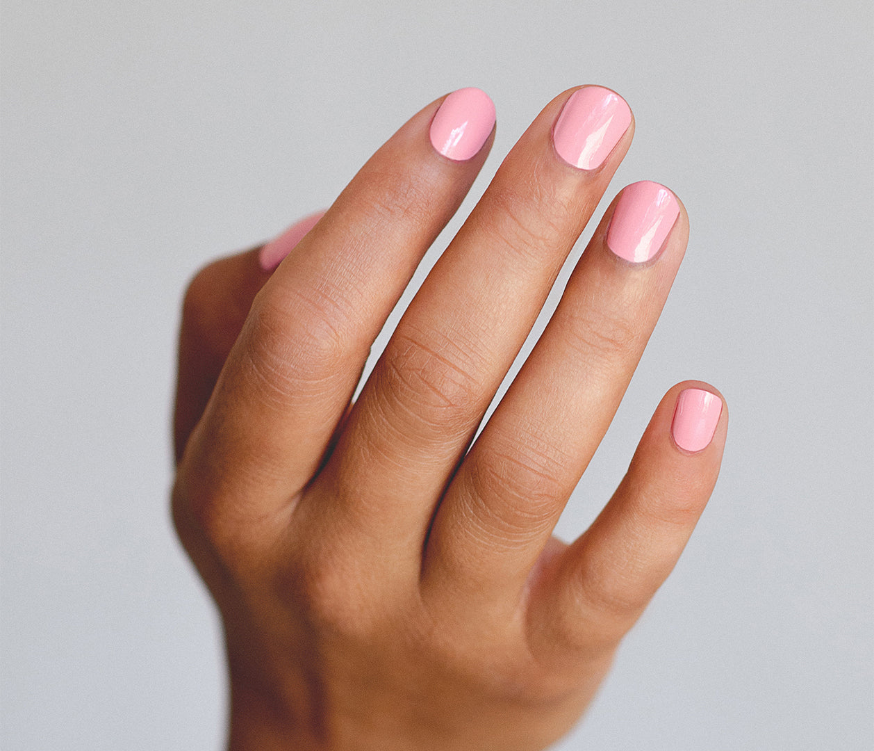 ballerina pink nail polish on tan skin tone by sienna