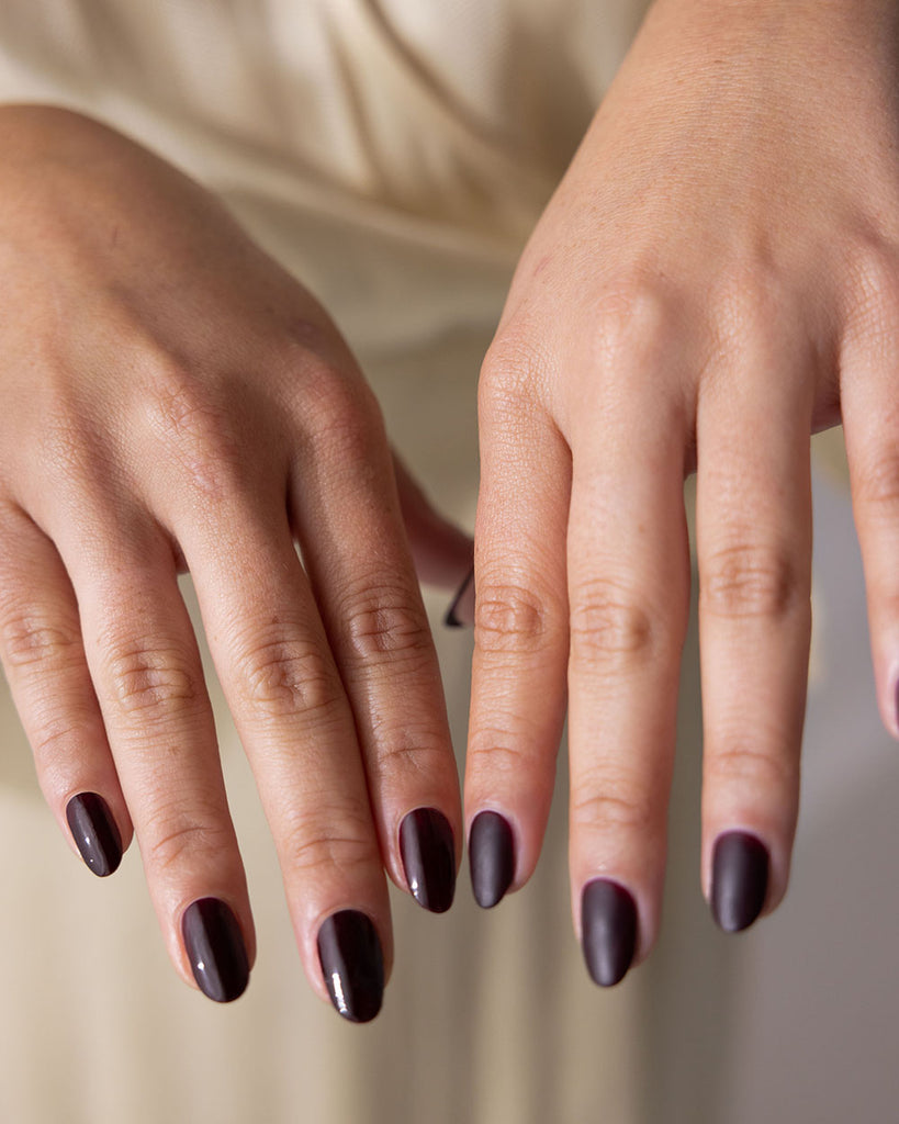 Olive skin hand tone wearing nail polish nail art by Sienna Byron Bay.