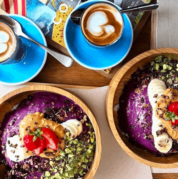 top view of acai bowl and coffee at combi cafe in byron bay