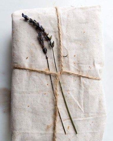 eco-friendly linen gift wrapping with lavender branches