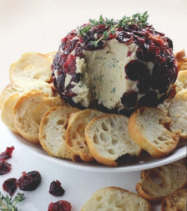 Vegan Cheese Ball with dried cranberries and croutons