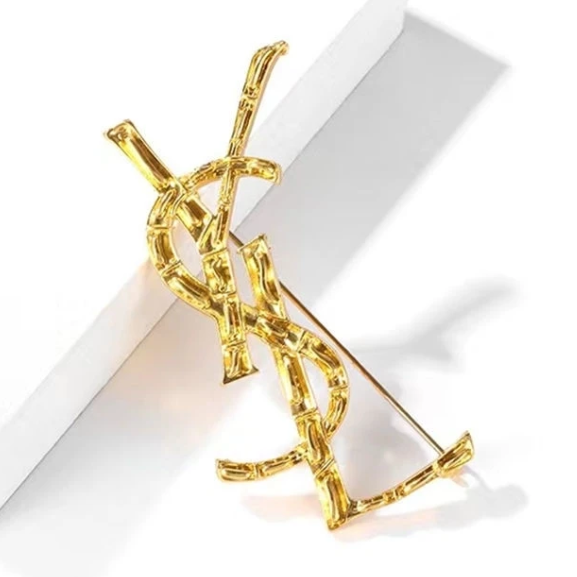 YSL Saint Laurent Fashion men's and women's brooches Alloy electroplating bamboo letter cors