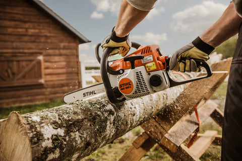 Stihl MS180C Chain Saw in action