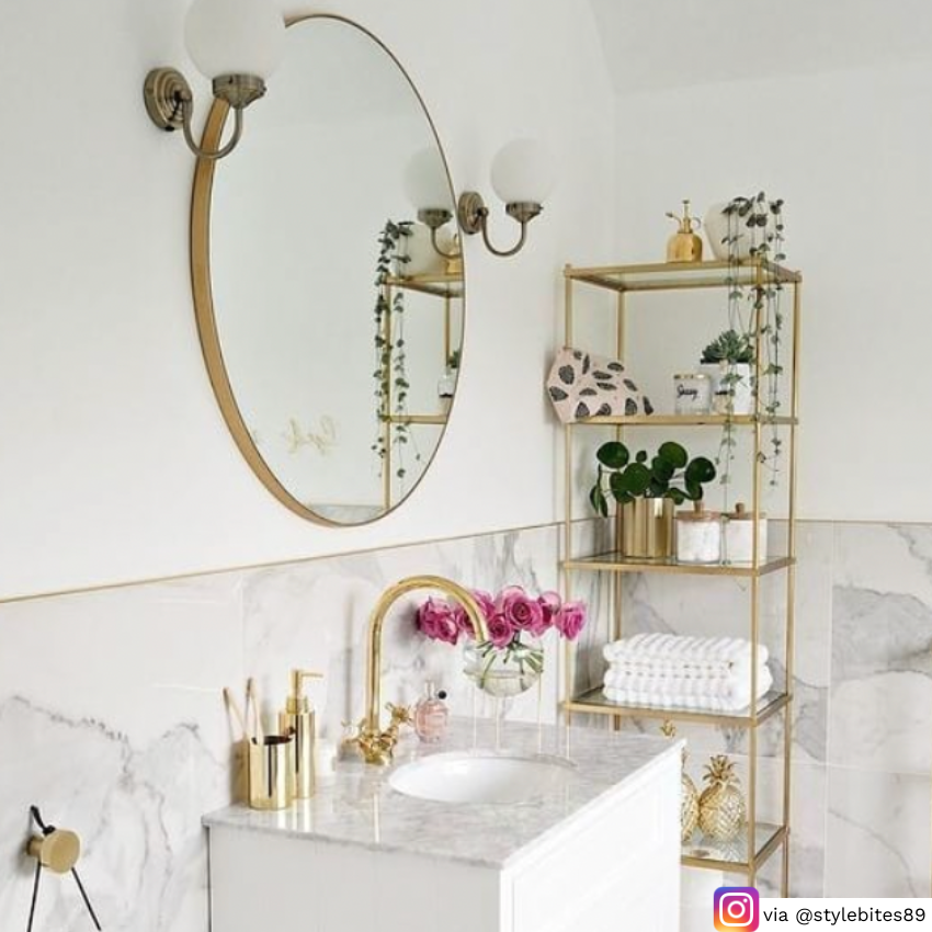 white and gold storage bathroom