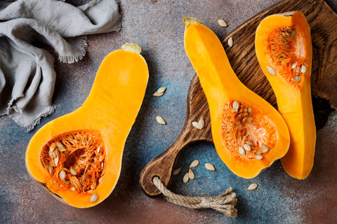 Slices of Butternut Squash laid out on a table