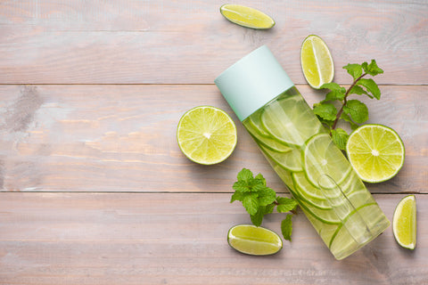 Detox Infused Water with Lime and Mint in Sports Bottle