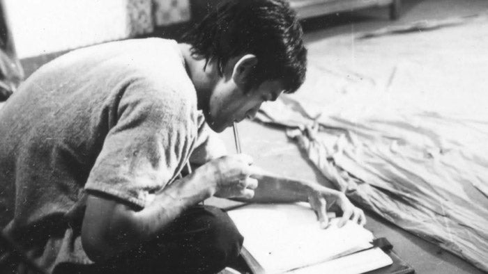 bruce_lee_reading_and_writing