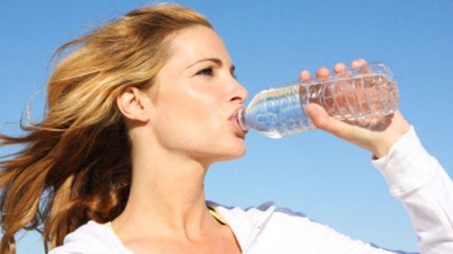 woman drinking water