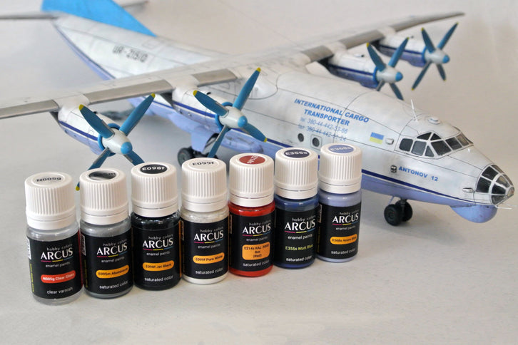 Arcus paints in front of the Antonov An-12 model