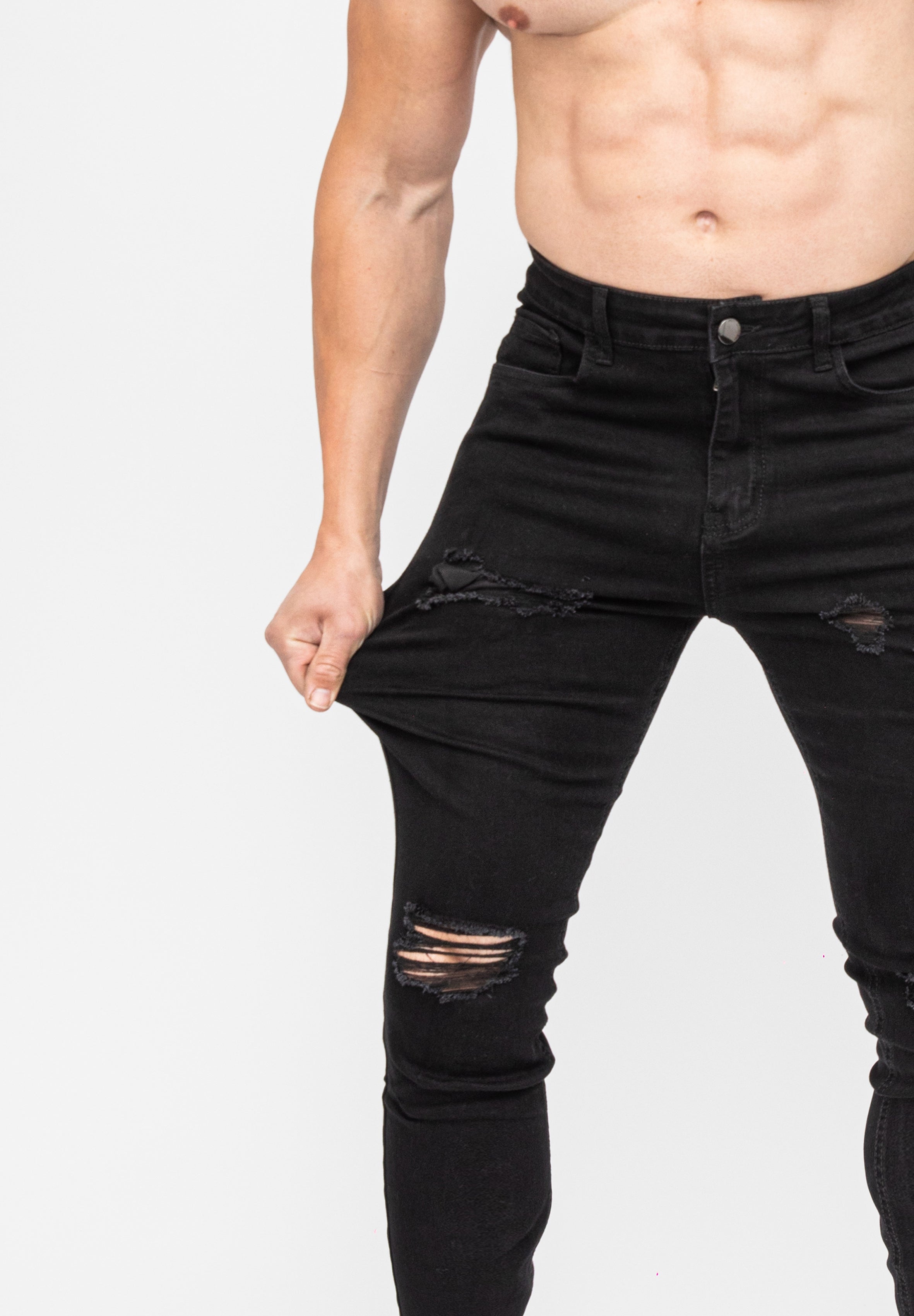 low rise black ripped skinny jeans