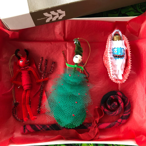 Devil, Dancing Tree Lady, Yeti, and plaid candy cane ornaments