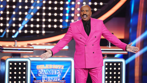 Steve-Harvey-in-a-bright-pink-suit