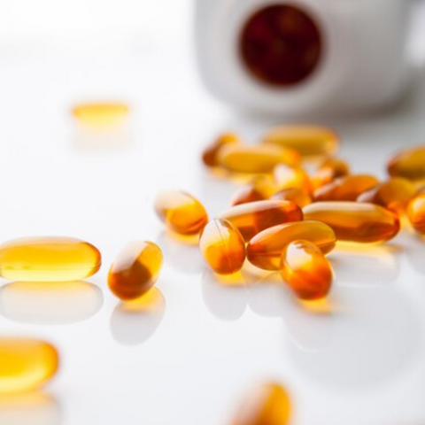 Close-up of some vitamin C capsules.