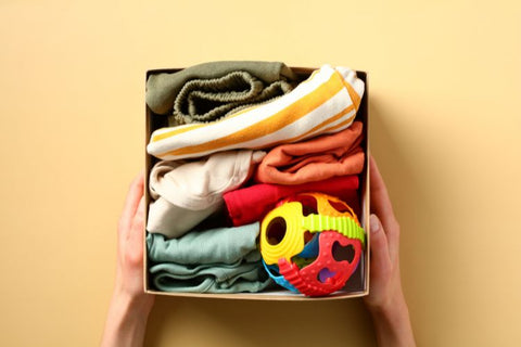 A box of clothes to donate to charity