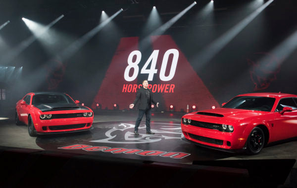 With 840 horsepower and 770 pounds-feet of torque from its supercharged 6.2-liter HEMI® Demon V-8 engine, the new 2018 Dodge Challenger SRT Demon is the most-powerful muscle car ever and the highest horsepower V-8 production car engine ever produced. Tim Kuniskis, Head of Passenger Cars --- Dodge, SRT, Chrysler and FIAT, FCA North America, unveiled the car at a star-studded event in New York on Tuesday, April 11. The Dodge Challenger SRT Demon is the first-ever production car to do a front-wheel lift as certified by Guinness World Records.