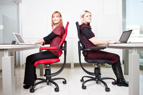 ergonomic office chairs Vancouver two ladies sitting back to back - Spinalis Chairs Canada 