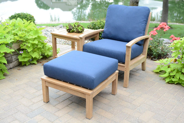 St. Lucia Teak Chair with blue cushions with an Ottoman