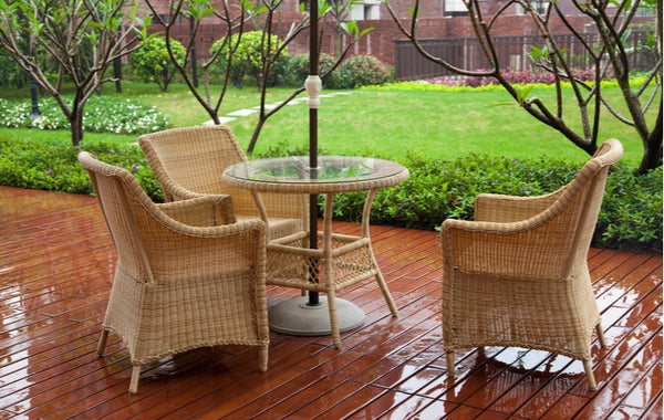 Outdoor wicker patio furniture out in the rain needing to be cleaned