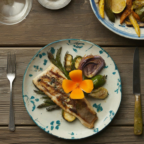 A food with a california poppy petals on top