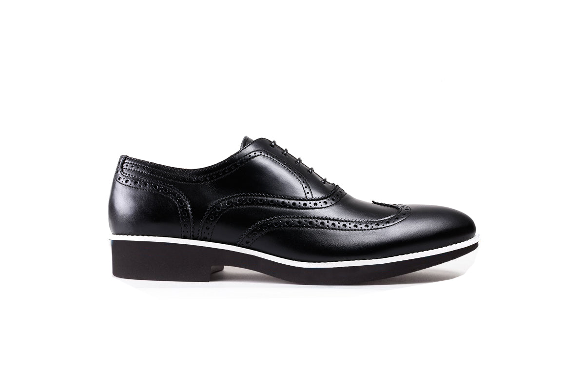 wingtip shoes with white soles