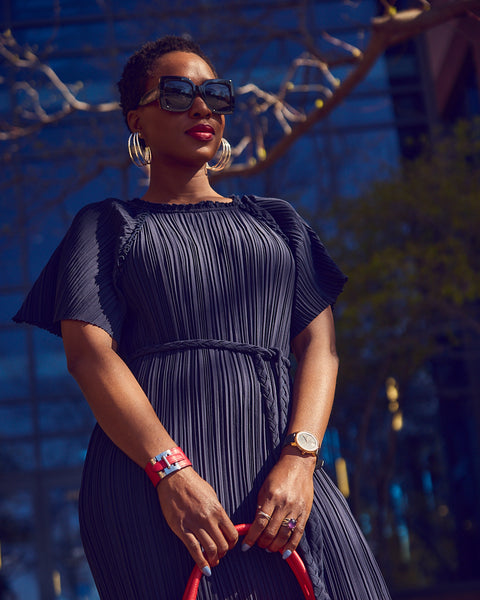 Farotelle wearing Ann Taylor's belted plissé blue midi dress as Spring Summer Office Workwear Dress Outfit.