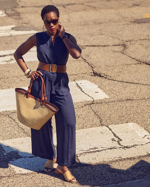 Farotelle wearing Ann Taylor blue belted sleeveless jumpsuit with Franco Sarto sandals and Fossil Summer tote as Spring Summer elevated casual outfit.