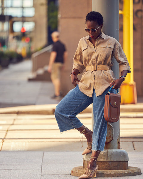 Fashion blogger Farotelle wearing Levi's cropped wide-leg jeans culotte with Ralph Lauren beige belted linen shirt, Sam Edelman lace-up heels, and Tomoli Fitini handbag as Spring Summer elevated casual denim outfit.