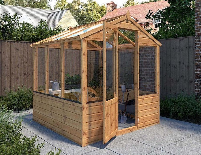 Narrow greenhouse in garden