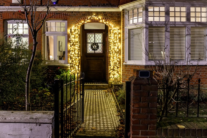 Front door of house around Christmas time