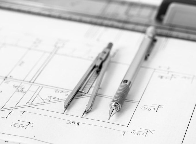 Mechanical pencil and mechanical stencil on blueprint