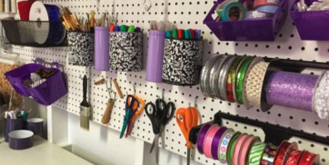 Peg board with arts and crafts tools