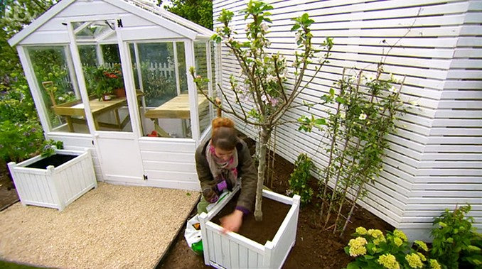 Wooden greenhouse featured in Love your garden ITV