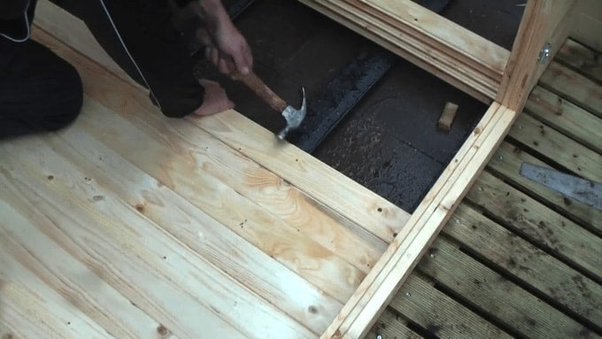 Installing flooring log cabin