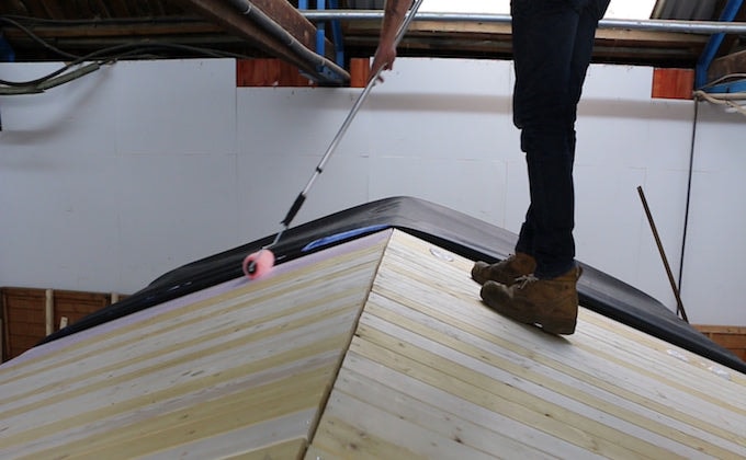 Apply glue to roof before applying EPDM