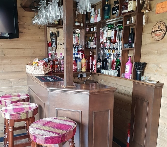Bar view in Black Pug log cabin