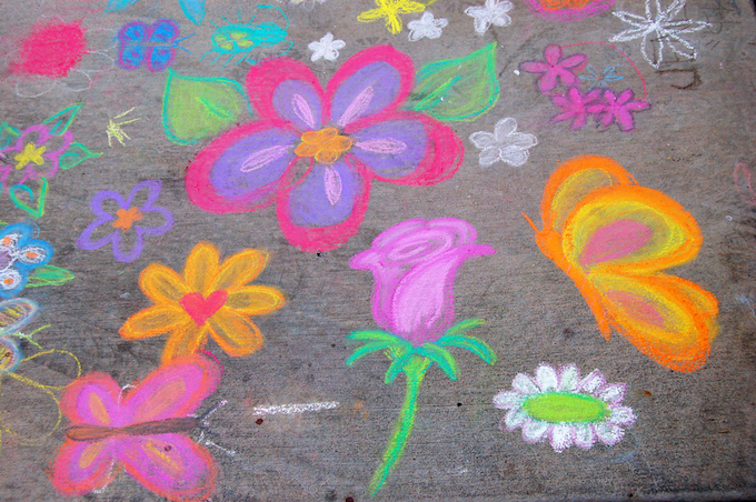 Chalk flowers on concrete