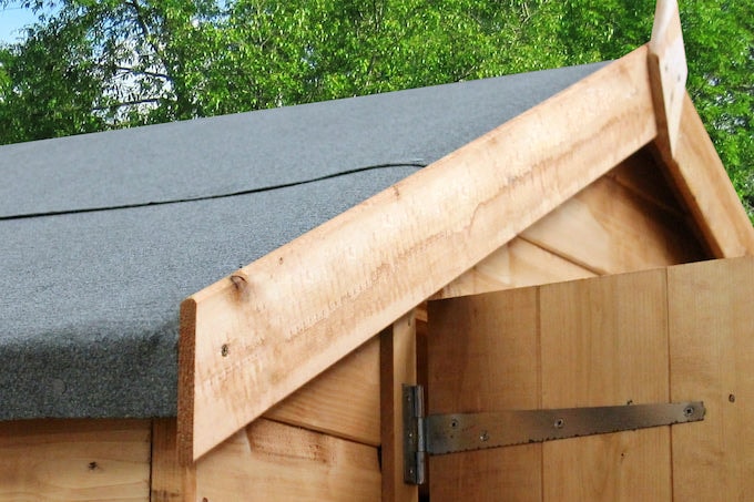 Closeup of roofing felt on wooden shed