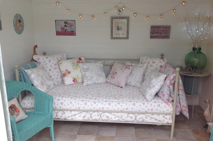 Cosy day bed in Waltons summerhouse