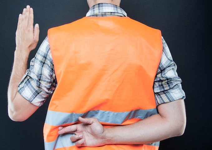 Cowboy electrician in high-res orange vest