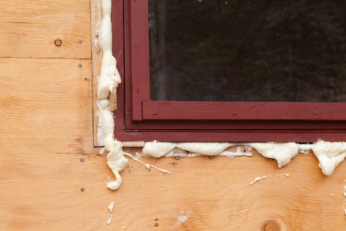 Expanding foam to waterproof windows in wooden shed
