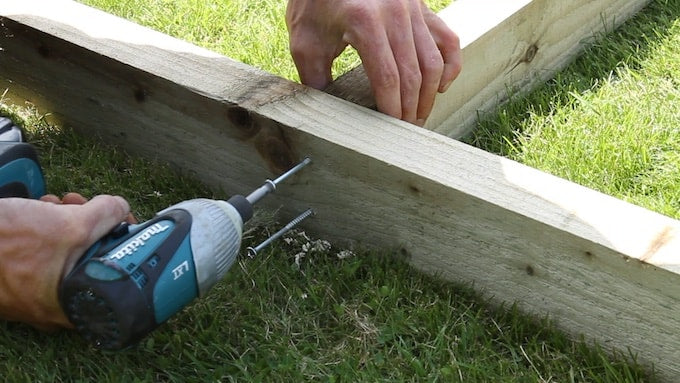 Drilling wooden shed base