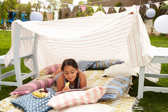 Garden den with little girl