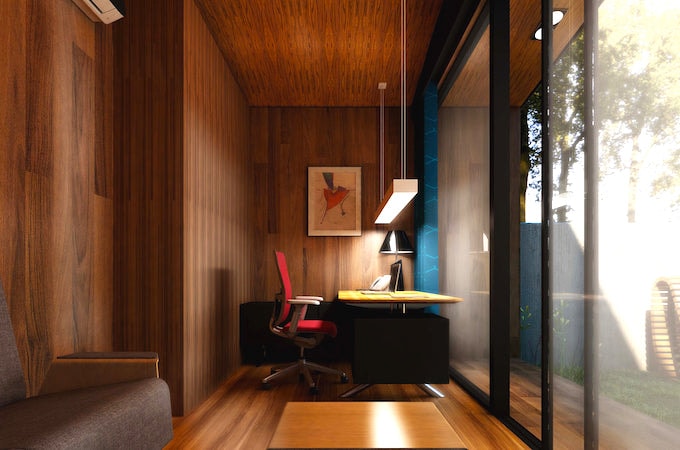 Dark wood garden office with red chair and desk